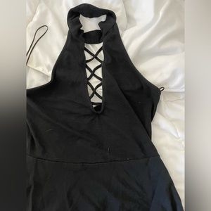 Black mini dress, high neck, low back size medium